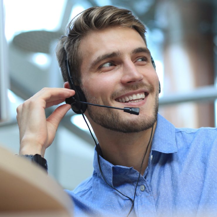 A Fidelity Group support adviser on a headset